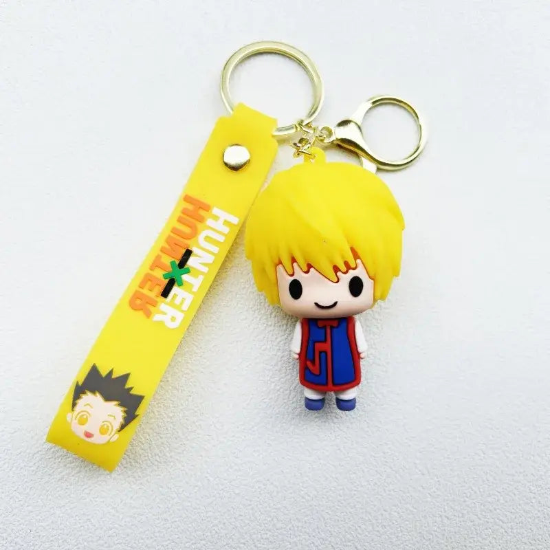 Yellow hunter x hunter killua keychain resin pendant with chibi character and matching yellow wristband hunter logo