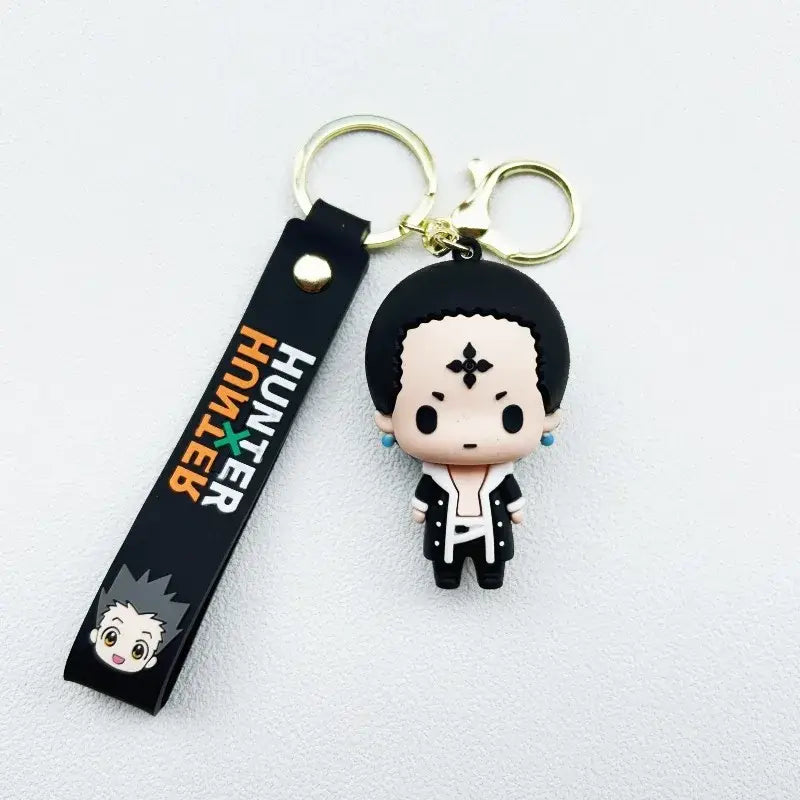 Black rubber hunter x hunter killua keychain resin pendant with chibi character in white outfit and blue earrings