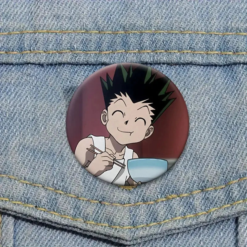 Hunter x hunter kurapika brooch pin featuring a circular cartoon badge with a smiling anime character holding chopsticks over a bowl