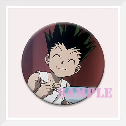 Round hunter x hunter kurapika brooch pin featuring an anime character with spiky black hair holding chopsticks over a bowl