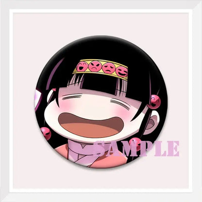 Hunter x hunter kurapika brooch pin featuring a black round button with a cartoon character wearing a yellow headband