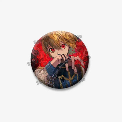 Circular hunter x hunter kurapika round brooch featuring blonde hair anime character with red eyes holding chain on red background