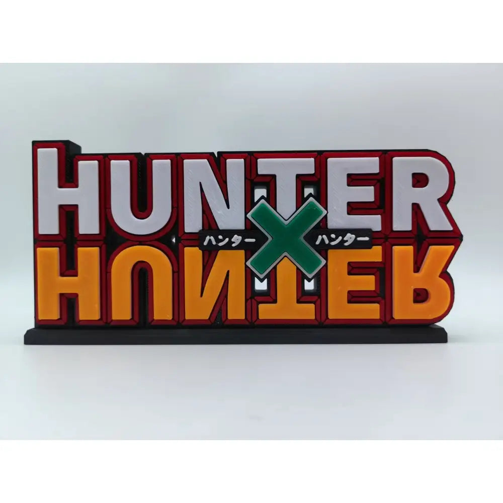 Vibrant red white and orange 3d hunter x hunter logo stand plaque with green cross emblem hunter logo ornament