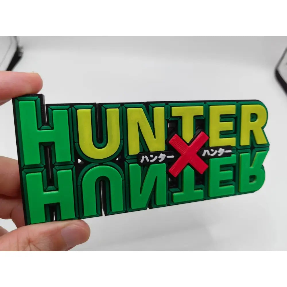 Hunter x hunter logo stand green and yellow 3d printed plaque with red cross signature ornament