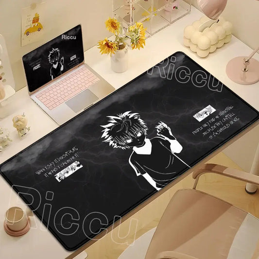 Black rectangular hunter x hunter desk mat featuring white anime character with lightning effects and riccu branding