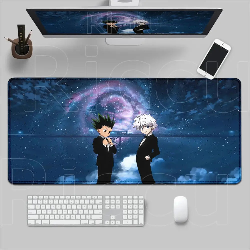 Long rectangular hunter x hunter mouse pad with two anime characters in black suits on a cosmic desk mat