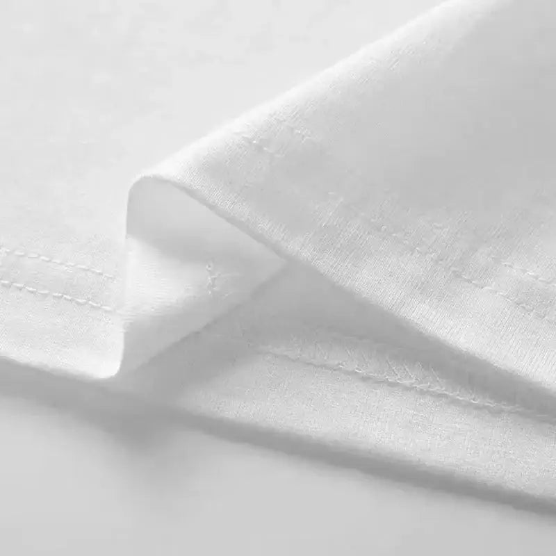 White cotton fabric with neat fine stitching on the folded edge of hunter x hunter shizuku murasaki loose fit t-shirt