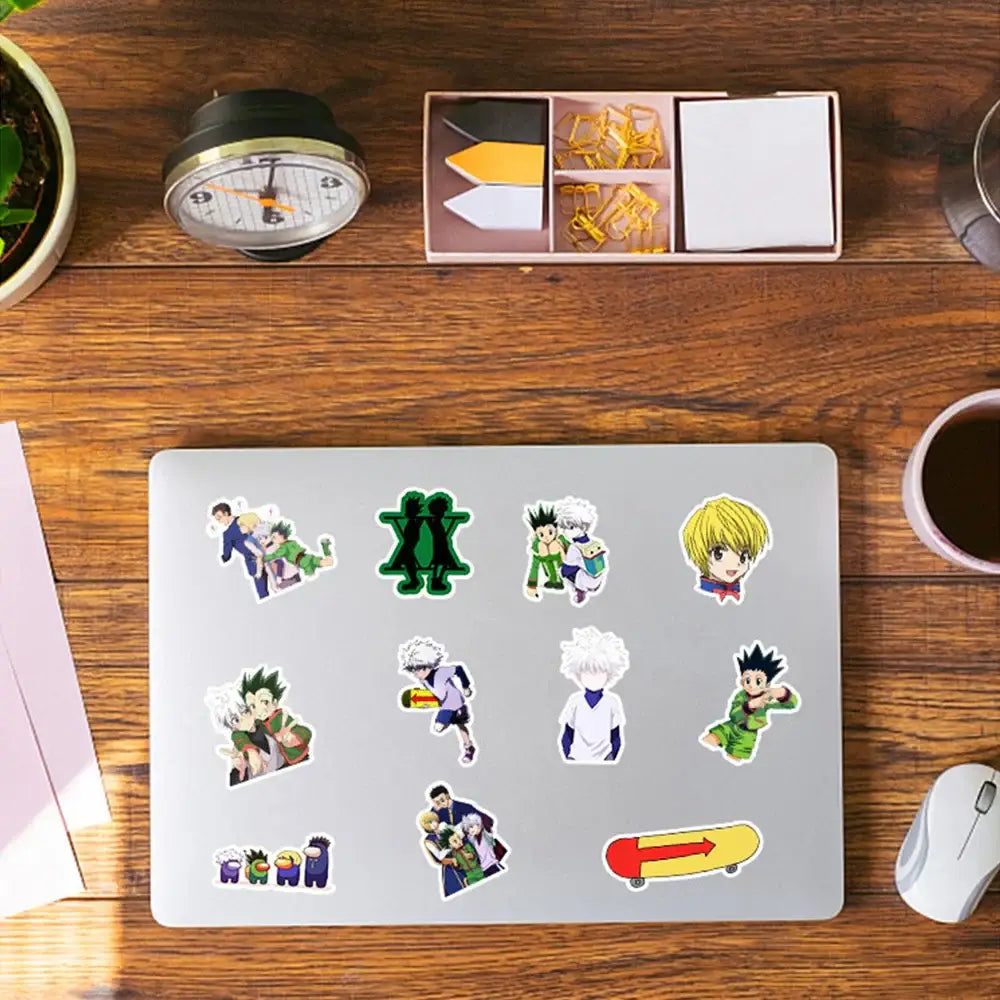 Silver laptop decorated with colorful hunter x hunter sticker pack made of waterproof vinyl decals
