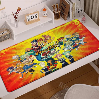 Vibrant red and yellow inazuma eleven desk mat mouse pad with rubber anti slip base featuring beyblade burst characters and flames
