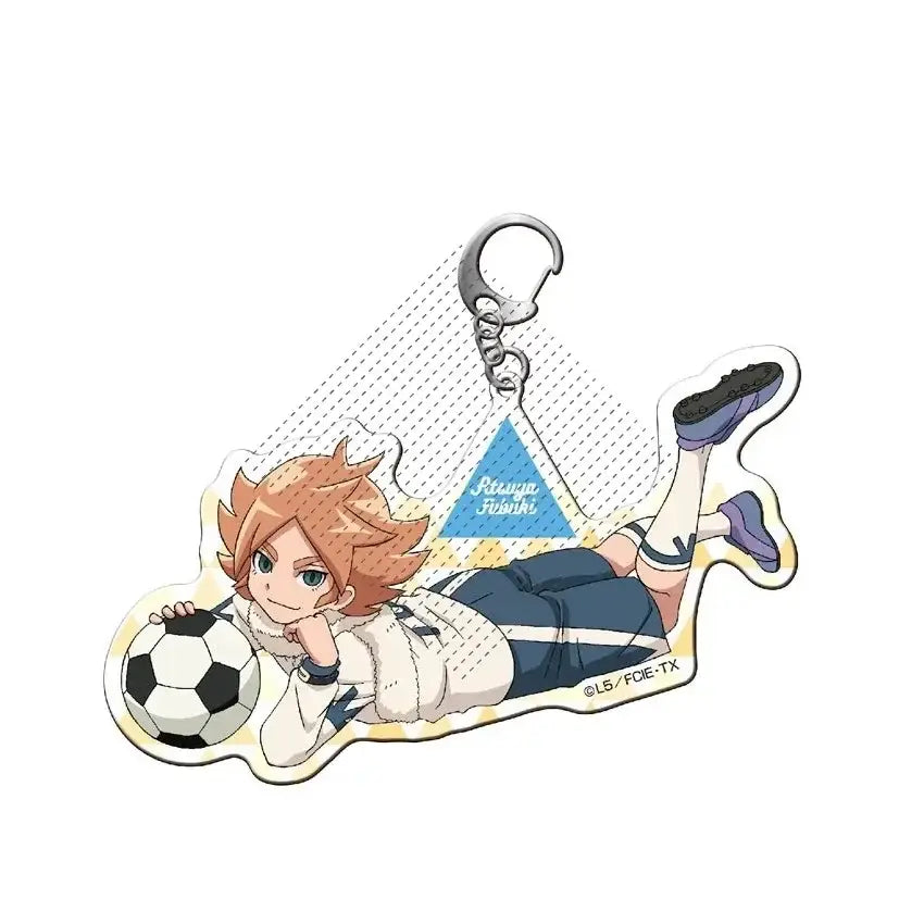 Clear acrylic shuya goenji keyring featuring orange-haired anime character holding a black and white soccer ball