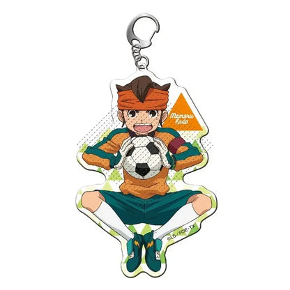 Orange and green shuya goenji acrylic keyring featuring a black and white soccer ball design anime gift