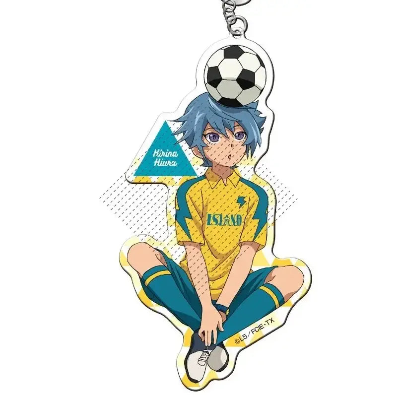 Yellow and teal shuya goenji acrylic keyring featuring anime character balancing a black and white soccer ball on head