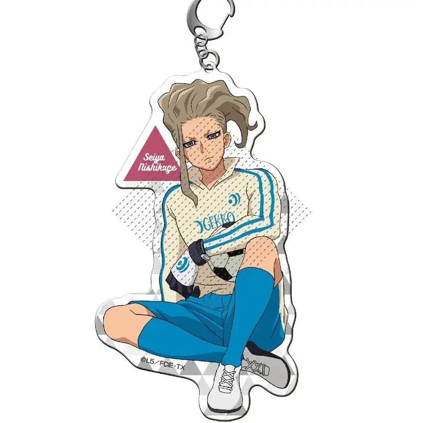 Clear acrylic shuya goenji keychain featuring anime character in cream and blue soccer jersey with yegko print