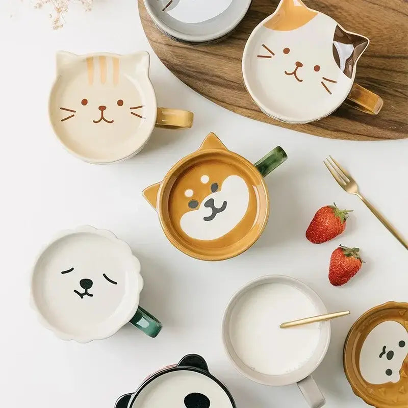 Cute ceramic Japanese cat mug with lid and small dish shaped like colorful cats and dogs with painted facial features