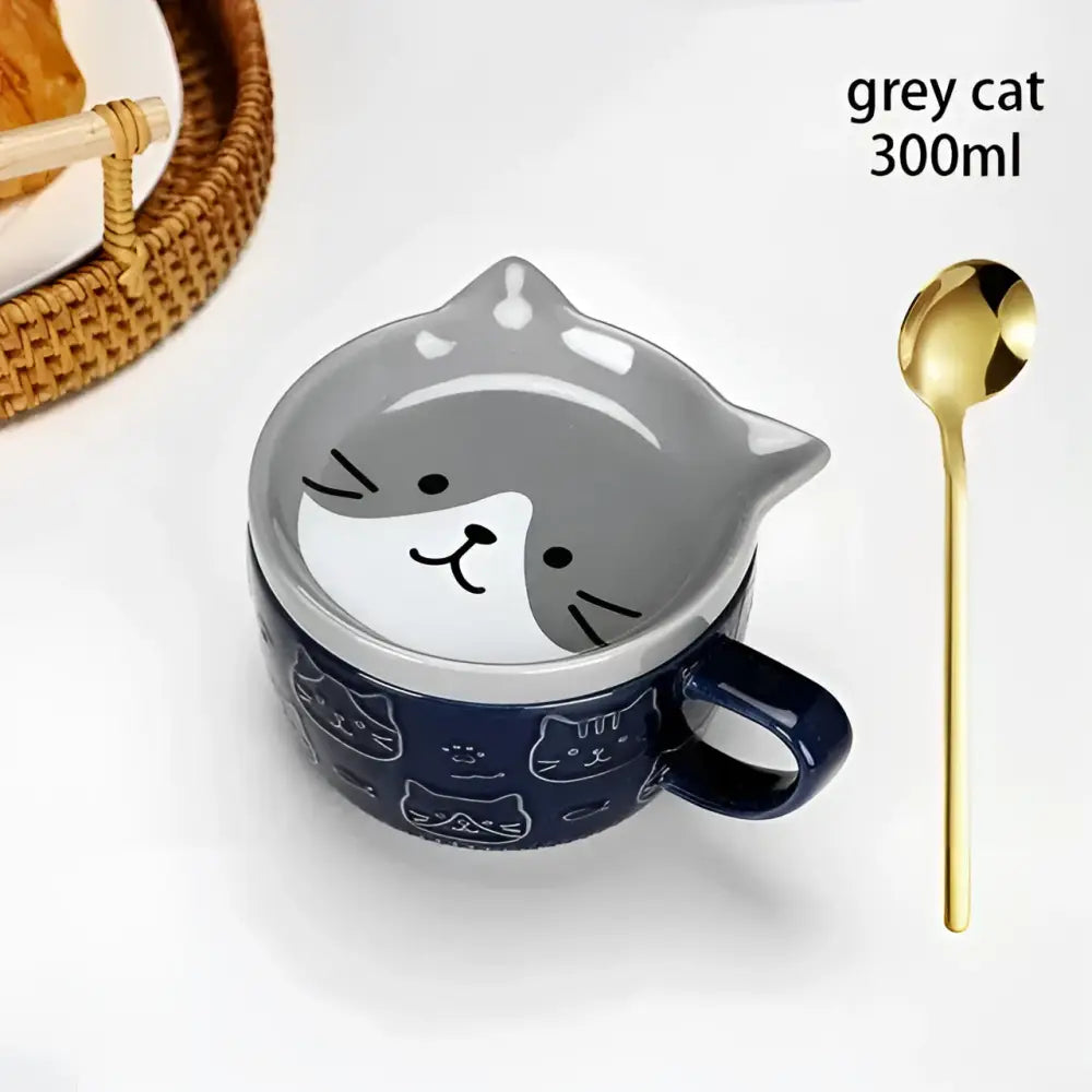 Japanese cat mug with lid small dish grey and white ceramic with navy base featuring smaller cat faces and golden spoon
