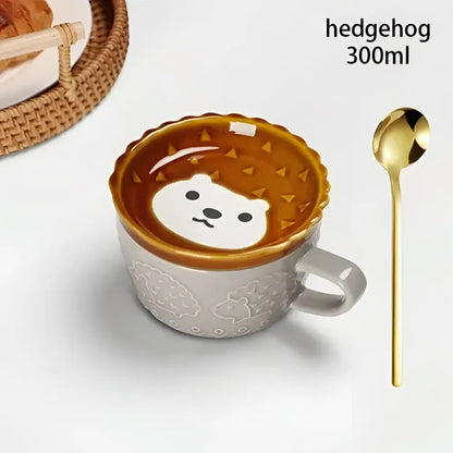 A gray ceramic japanese cat mug with an orange spiky hedgehog lid and matching small dish for 300ml capacity