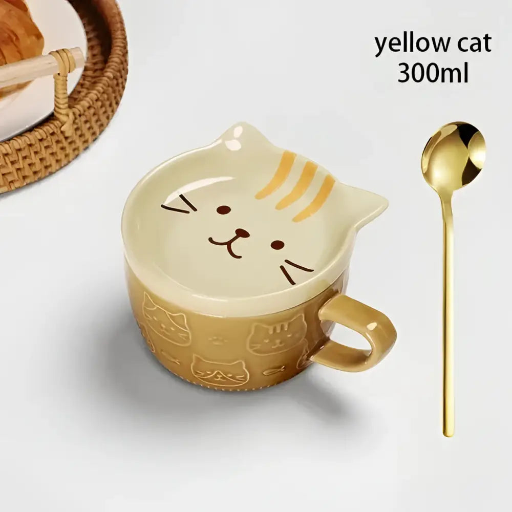 Japanese cat mug made of yellow ceramic with a glossy finish and subtle gold stripes, includes lid and small dish