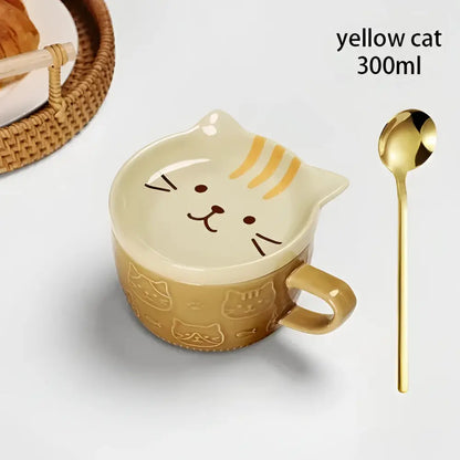 Japanese cat mug made of yellow ceramic with a glossy finish and subtle gold stripes, includes lid and small dish