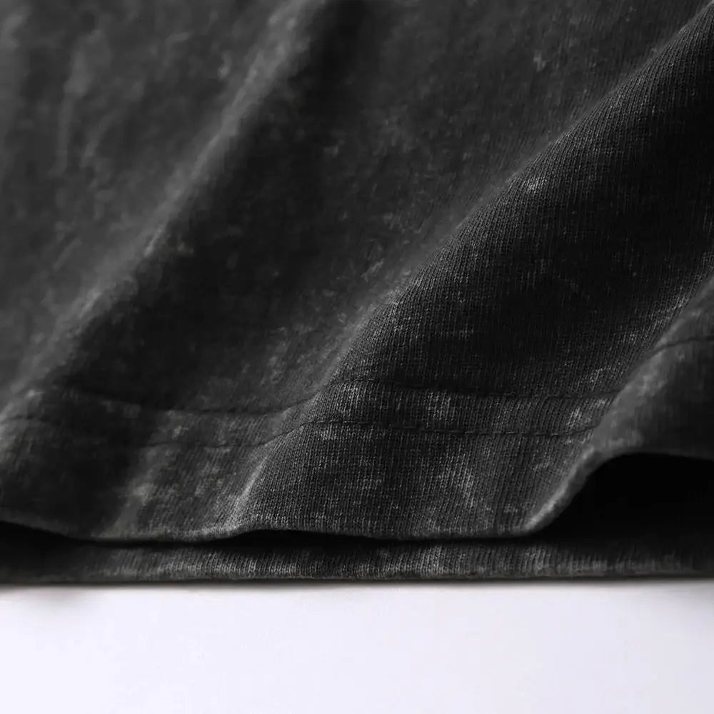 Black velvet fabric with soft plush texture and subtle sheen on japanese takoyaki graphic oversized cotton t-shirt