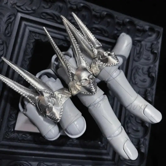 Silver skull-themed d4c cosplay ring with spikes and chains adjustable for jojo’s bizarre adventure steel ball run fans
