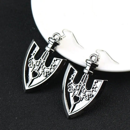Silver and black axe-shaped drop earrings with intricate engravings for jojo’s bizarre adventure cosplay jewelry