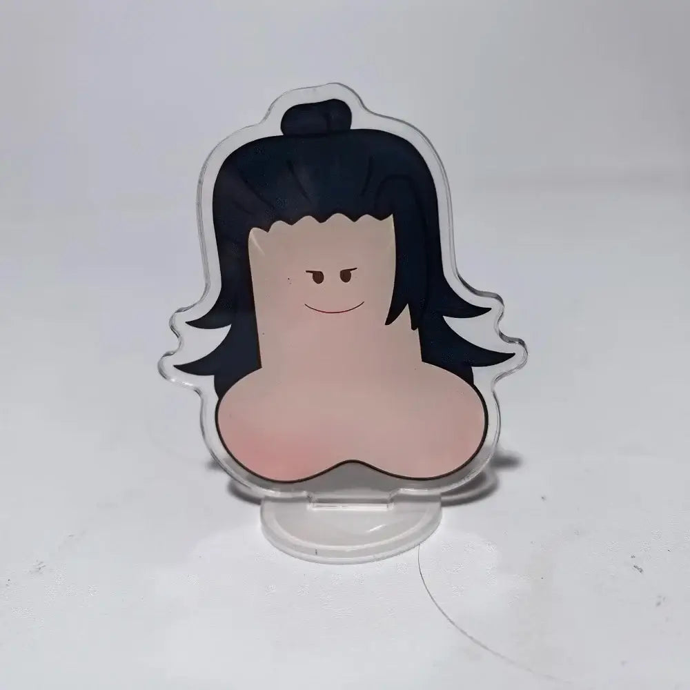Clear acrylic jujutsu kaisen mini stand featuring a smiling cartoon character with black hair and pink skin