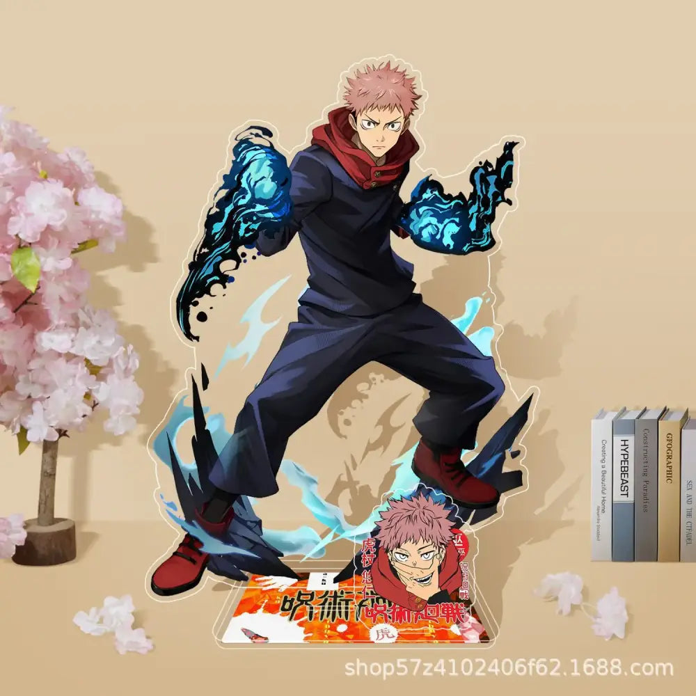 Translucent acrylic stand of yuji itadori from jujutsu kaisen in dynamic pose with blue energy collectible decor