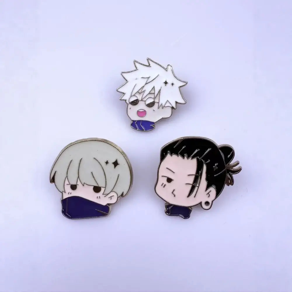 Three jujutsu kaisen chibi character enamel pins in distinct colors as alloy brooch metal badges on white background