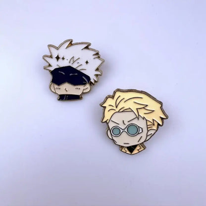 Two jujutsu kaisen alloy brooch enamel pins featuring anime heads with spiky white hair and blonde hair with glasses