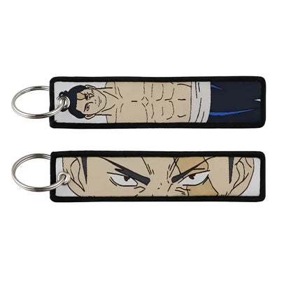 Two rectangular jujutsu kaisen gojo satoru embroidery keychains featuring a muscular figure and intense eyes design