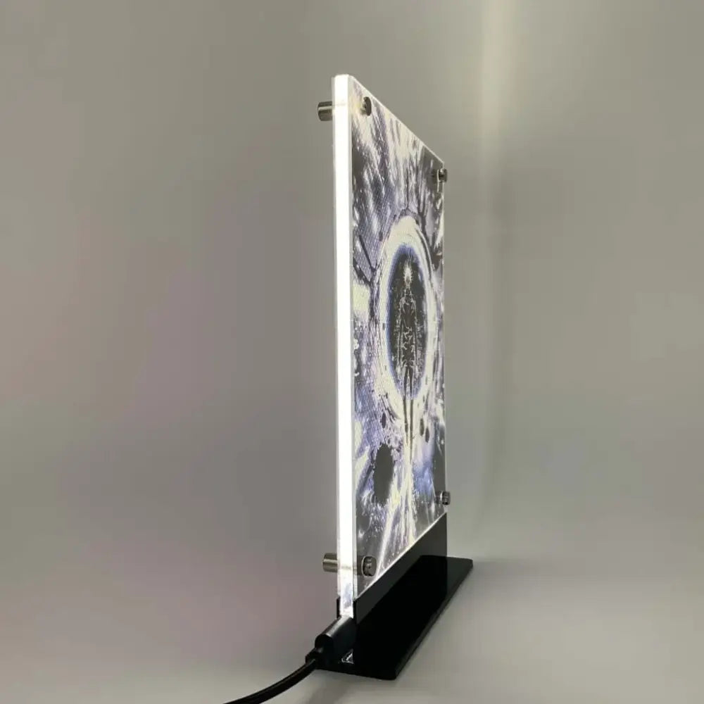 A sleek illuminated acrylic jujutsu kaisen gojo satoru led panel with cosmic blue and black artwork night light