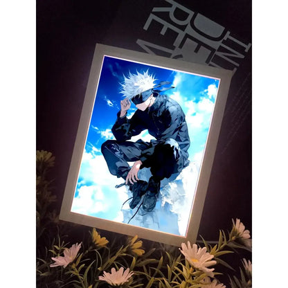 A glowing acrylic framed gojo satoru led night light featuring spiky white hair against a bright blue sky