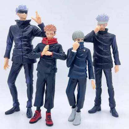 Four jujutsu kaisen action figures in dark blue and black uniforms with one in red boots display quality figure set