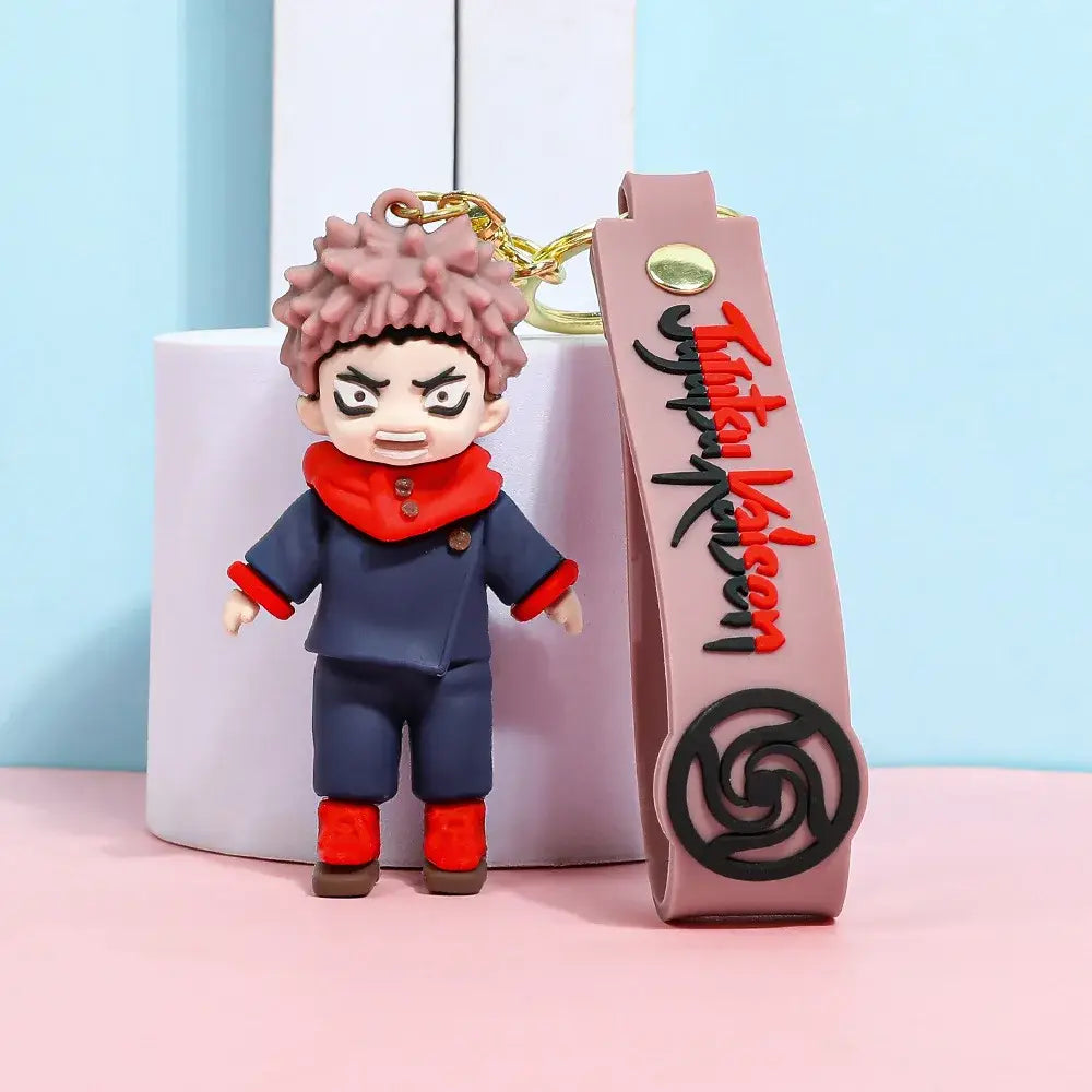 Pink and navy blue gojo satoru plush keychain featuring spiky hair and red scarf from jujutsu kaisen backpack charm