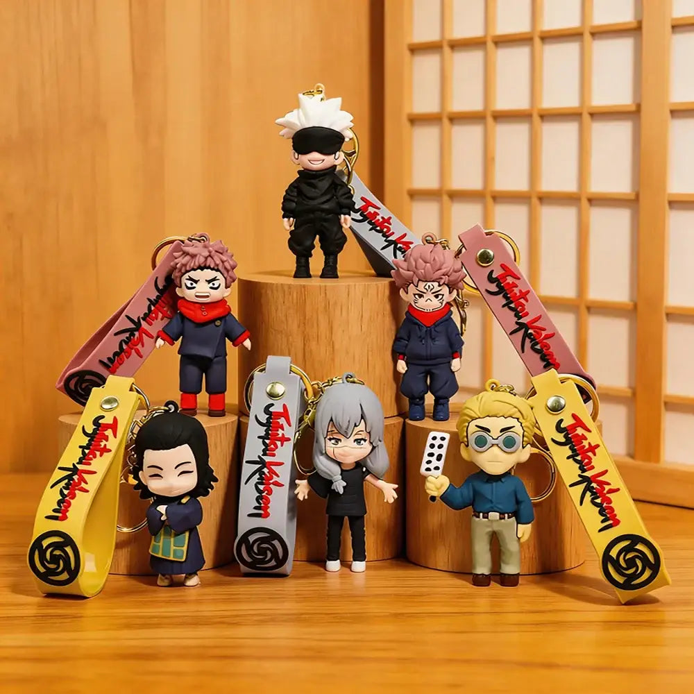 Black and white gojo satoru plush keychain with spiky hair and red scarf standing on wooden pedestal jujutsu kaisen charm