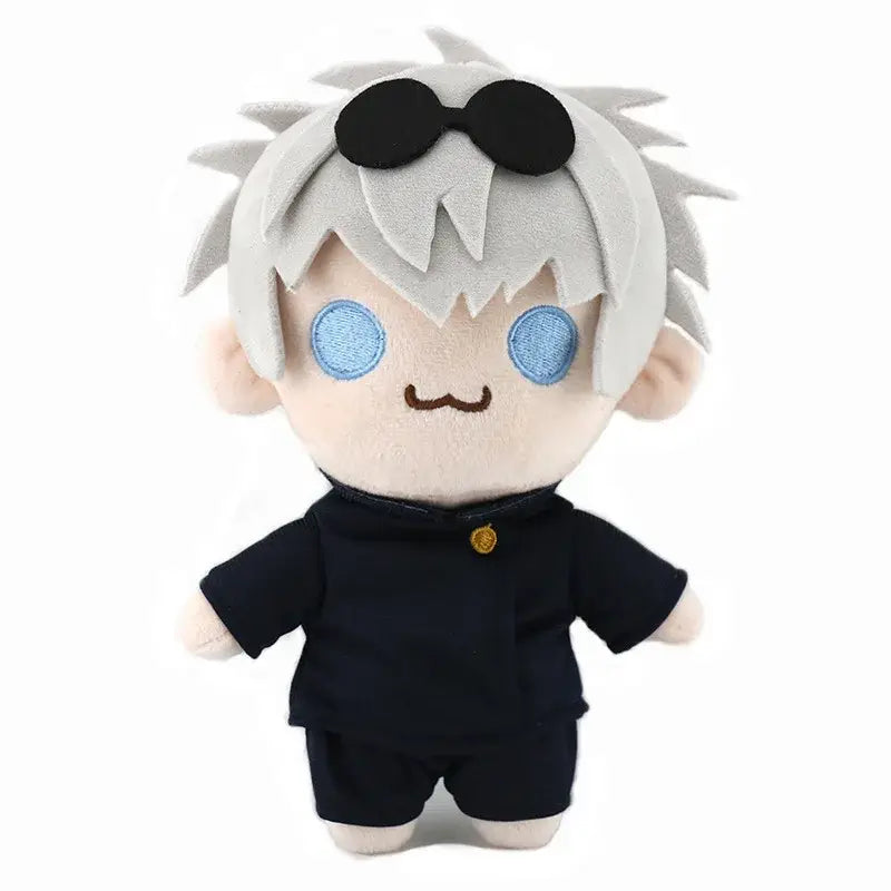 A jujutsu kaisen gojo satoru plush with spiky silver hair, blue embroidered eyes, black sunglasses, and navy-blue outfit