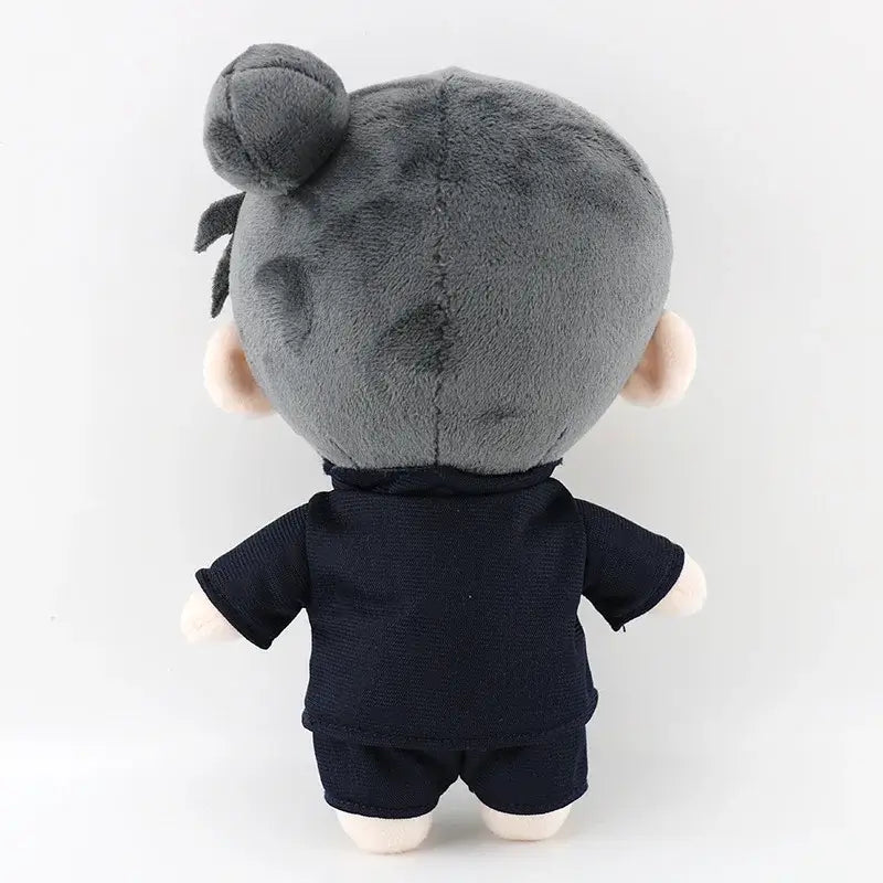 Gray plush gojo satoru doll with bun hairstyle wearing navy blue outfit from jujutsu kaisen soft cosplay plush