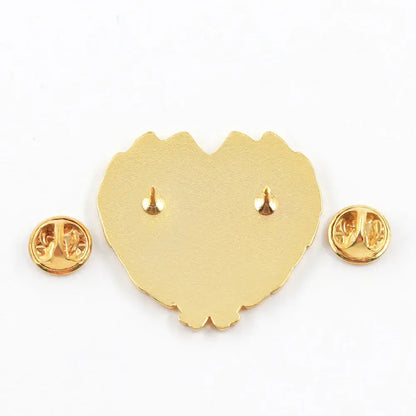 Gold-colored heart-shaped enamel pin with textured surface and two small pins on back 38mm x 40mm jujutsu kaisen