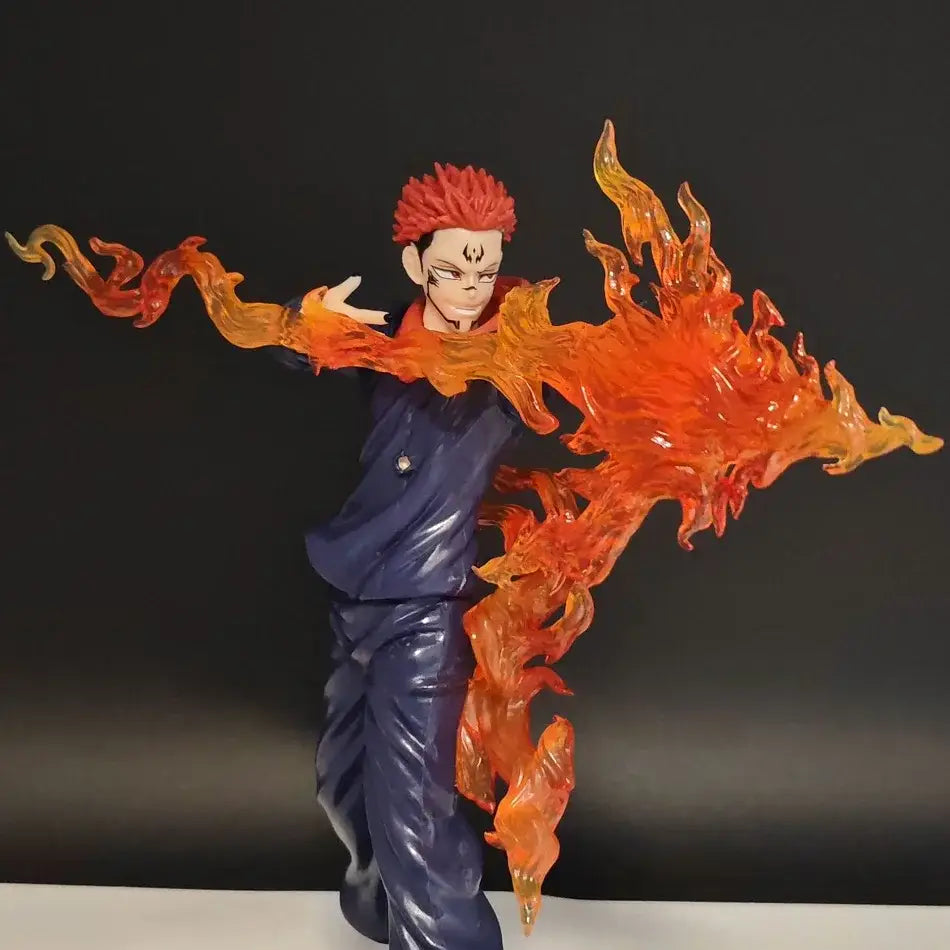 Detailed 22cm jujutsu kaisen itadori yuji pvc statue with vibrant red hair, sharp markings, and orange flame effects