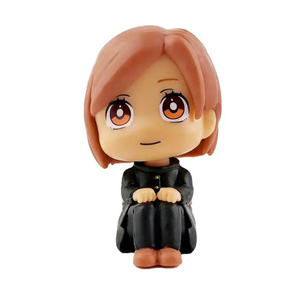Chibi-style jujutsu kaisen mini figure set featuring a girl with short brown hair large orange eyes in a black coat pvc collectible