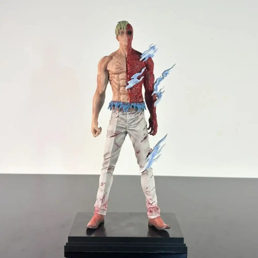 Detailed nanami kento pvc statue from jujutsu kaisen featuring a muscular man with red and tan body and blue flame accents