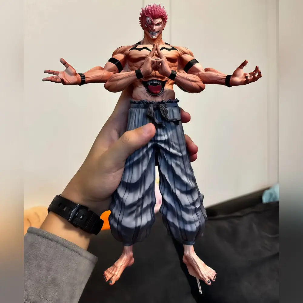 Detailed muscular ryomen sukuna anime statue with vibrant pink hair and gray striped pants 12 inch pvc collectible
