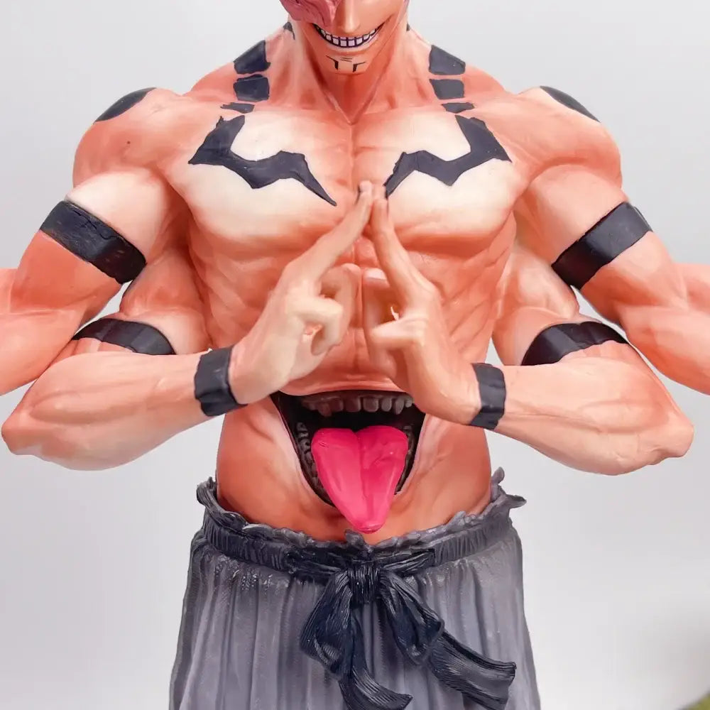 Peach-colored jujutsu kaisen ryomen sukuna pvc statue with black lightning markings and gray pants resin figurine