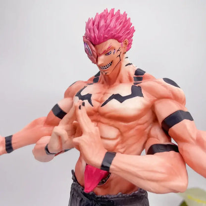 Detailed jujutsu kaisen ryomen sukuna pvc statue with muscular build, vibrant pink hair, and black tribal markings