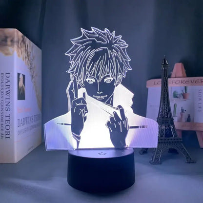A glowing translucent acrylic jujutsu kaisen satoru gojo night light with spiky hair silhouette and finger touch remote control