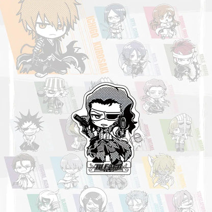 Jujutsu kaisen black and white chibi acrylic stand holding pistols with halftone shading and bleach logo at bottom
