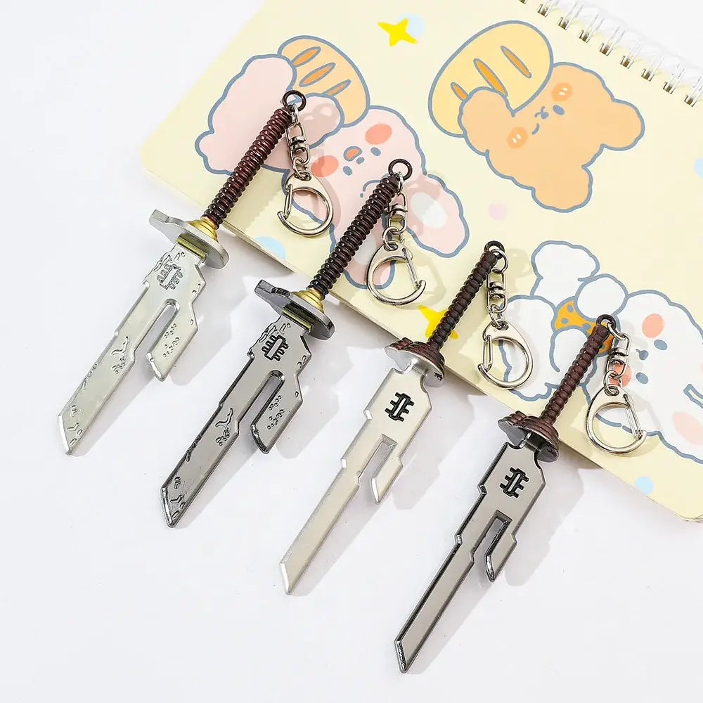Silver metallic jujutsu kaisen toji inverted spear keychain with brown textured hilts and engraved designs pendant