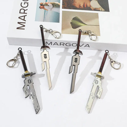 Silver metallic jujutsu kaisen toji inverted spear keychain with detailed engravings and brown textured hilts