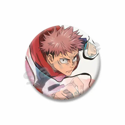Circular yuji itadori enamel pin featuring spiky pink hair anime character in red hooded garment action pose