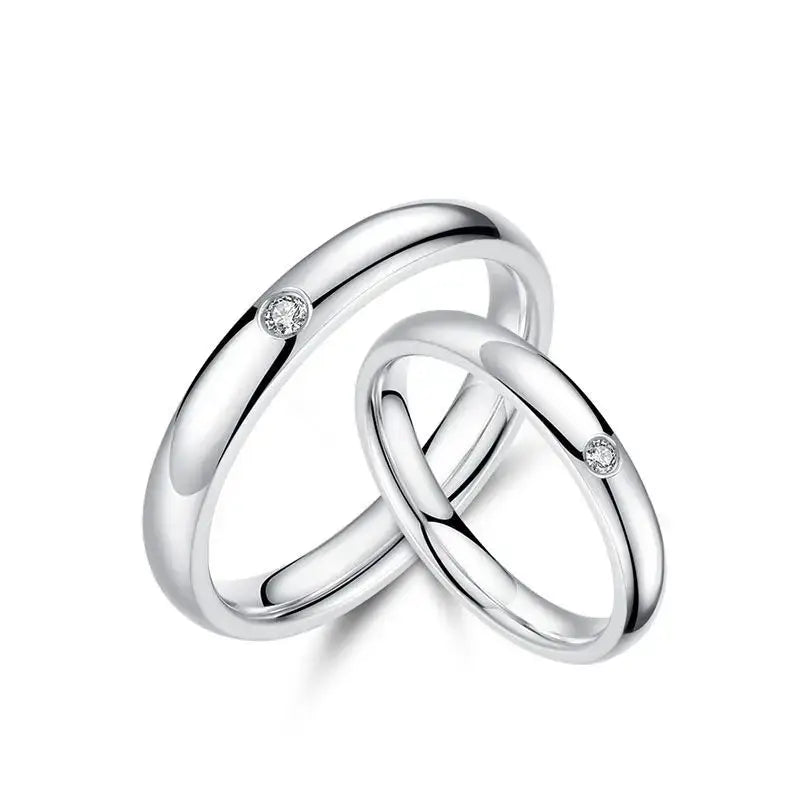 A sleek silver-toned jujutsu kaisen yuta okkotsu ring set with polished finish and small diamond accents for wedding jewelry